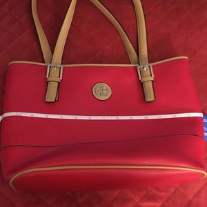 Red Giani Bernini hand bag with tan trim.